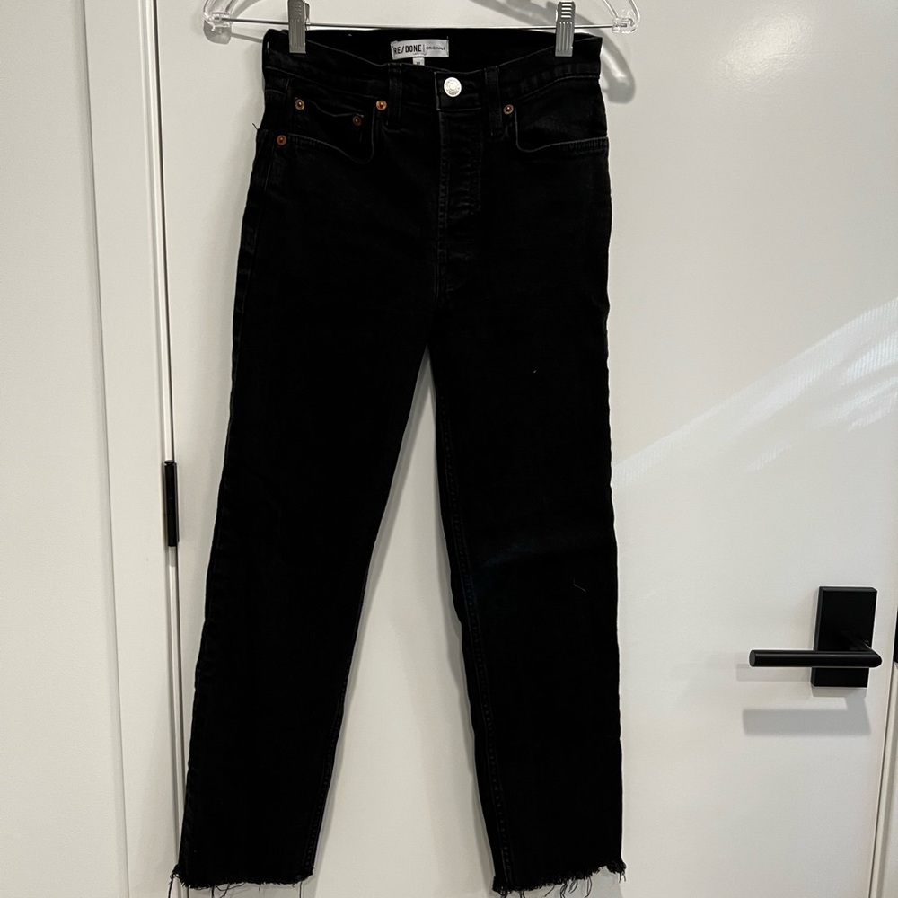 Redone black cropped stove pipe jeans with raw hem